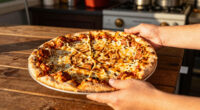 Little Caesars’ New ‘Webbed Pizza’ Comes With Something Special for Spider-Man Fans